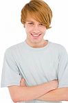 Teenage Boy With Arms Crossed Stock Photo