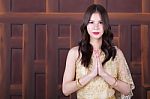 Thai Women Welcome With Traditional Thai Suit Stock Photo