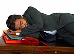 Tired Businessman Sleeping Stock Photo
