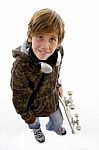 Top View Of Smiling Child With Skateboard Stock Photo