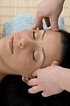 Top View Of Woman Taking Head Massage Stock Photo