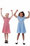 Two Excited Young Girls In Joyous Mood Stock Photo