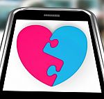 Two-pieced Heart On Smartphone Showing Complement Stock Photo