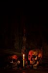 Two Skull Still Life With Knife In Dark Scene For Halloween Nigh Stock Photo