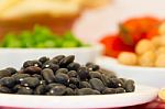 Variety Of Kitchen Ingredients With Fresh And Dried Legumes Stock Photo