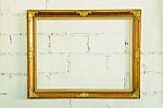 Vintage Gold Picture Frame On White Wall Stock Photo