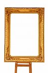 Vintage Gold Picture Frame With Wooden Easel Isolated On White Stock Photo
