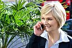 Woman Attending A Business Call Stock Photo