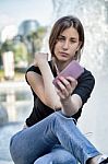Woman Checking Her Smart Phone Stock Photo