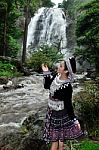 Woman Enjoy With Waterfall Stock Photo