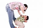 Woman Hitting Her Son Stock Photo