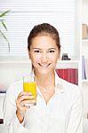 Woman Holding Glass Of Orange Juice Stock Photo