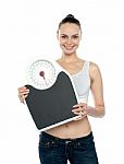 Woman Holding Weighing Scales Stock Photo