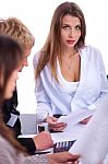 Woman In Business Meeting  With Her Colleagues Stock Photo