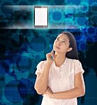 Woman Looking Mobile Phone On World Technology Background Stock Photo