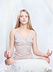 Woman Meditate At Home Stock Photo