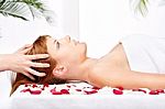 Woman On Head Massage Treatment Stock Photo