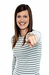 Woman Pointing Her Finger Towards The Camera Stock Photo