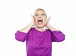 Woman Shouting With Hands On Ears Stock Photo
