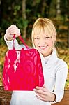 Woman Showing Her Shopping Bag Stock Photo