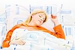 Woman Sleeping In Bed Stock Photo