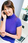 Woman Talking On Cell Phone Stock Photo