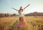 Woman With Arms Outstretched Stock Photo