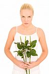 Woman With Rose Stems Stock Photo