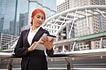 Woman With Tablet At Modern City Stock Photo