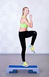 Woman Workout Fitness Doing Step Aerobic Exercise Stock Photo