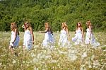 Women Walking Meadow Stock Photo