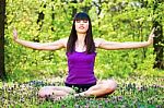 Yoga Relaxation In Forest Stock Photo