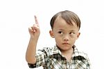 Young Asian Boy With Hand Sign Stock Photo