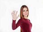 Young Beautiful Girl Holding An Imaginary Plate Stock Photo