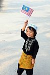 Young Boy Holding Flag Stock Photo