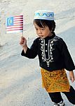 Young Boy Holding Flag Stock Photo