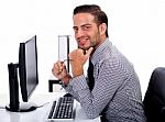 Young Business Man At The Office Stock Photo