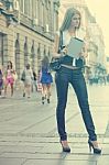 Young Business Woman With Tablet Computer Walking On Urban Stree Stock Photo
