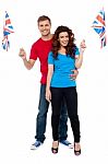 Young Couple Holding UK Flag Stock Photo