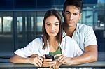 Young Couple With Smart Phone Stock Photo