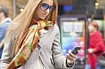 Young Fashionable Woman reading sms Stock Photo