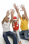 Young Friends With Raised Hands Stock Photo
