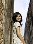 Young Girl At Wat Maheyong Temple. Ayutthaya Province - Thailand Stock Photo
