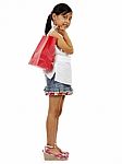 Young Girl Holding Shopping Bag Stock Photo