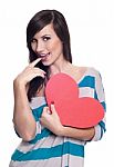 Young Happy Smiling Valentine Woman With Heart Symbol Stock Photo