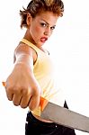 Young Lady Holding Knife Stock Photo