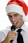 Young Man Singing Into Microphone Stock Photo