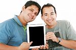 Young Men Showing Tablet Pc Stock Photo
