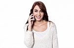 Young Smiling Lady Talking On Phone Stock Photo