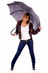 Young Woman Holding Umbrella Stock Photo